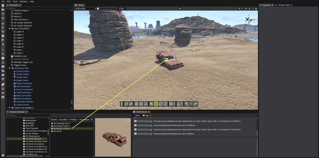 A car wreck prefab dragged from the Content Browser over the terrain (the arrow shows the drag)
