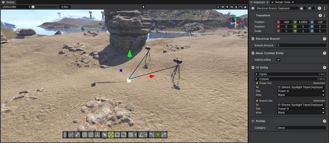 A small circuit, a switch into a branch into two lights, with the wires drawn in the scene view and the IO Entity panel open