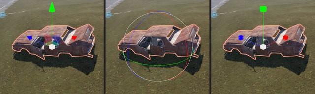 The move, rotate and scale gizmos side by side on a selected car wreck